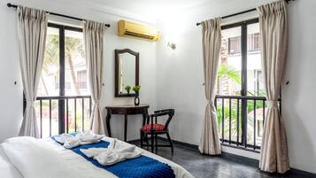 Luxury Apartment, 2 Bedrooms, Patio, Pool View | Iron/ironing board, free WiFi