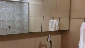 Shower, towels, toilet paper