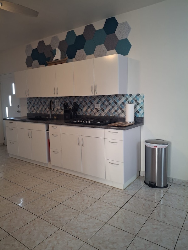 Fridge, microwave, stovetop, coffee/tea maker