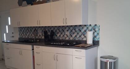 Family-Friendly 2BR in Isabela—AC in Every Room & Kid Essentials Near Beaches