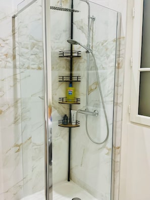 Shower, hair dryer, towels, soap