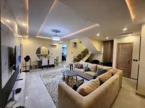 36-inch Smart TV with satellite channels, video-game console, Netflix