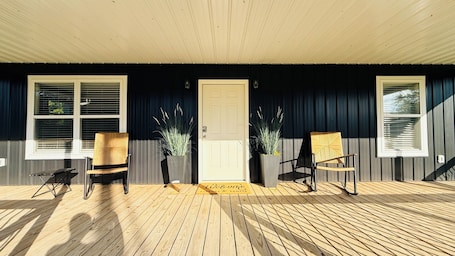 Terrace/patio. The Dock House Lake Retreat – Family-Friendly with Private River Access