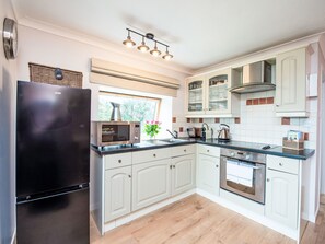 Fridge, microwave, oven, cookware/dishes/utensils