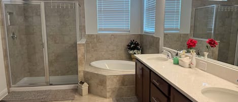 Shower, towels, soap, toilet paper