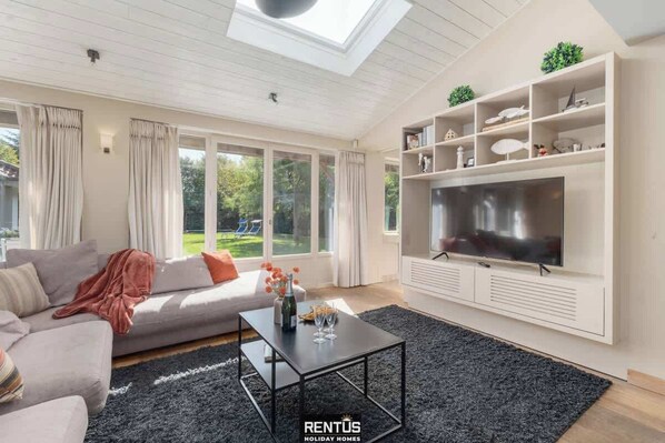 TV, fireplace, books, offices