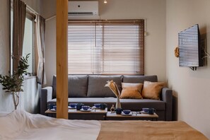 Appartement, non-fumeur, vue ville | Coin séjour