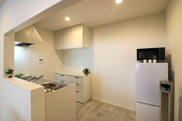 Apartamento básico, para não fumantes, vista para a cidade | Cozinha privada