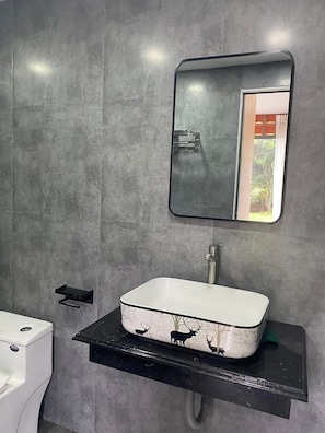 Shower, jetted tub, hair dryer, bidet