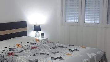 Blackout drapes, soundproofing, iron/ironing board, free WiFi