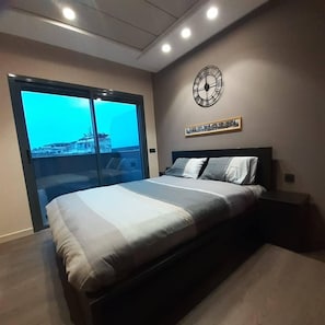 1 bedroom, desk, iron/ironing board, travel cot