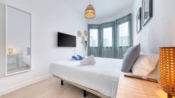 2 bedrooms, desk, iron/ironing board, travel crib