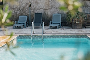 Seasonal outdoor pool, pool umbrellas