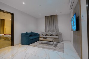 Family Apartment | Laptop workspace, blackout drapes, soundproofing, iron/ironing board