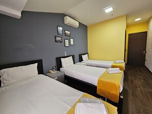 Triple Room, City View | Soundproofing, iron/ironing board, free WiFi