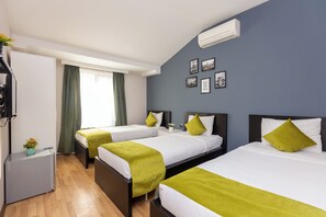 Triple Room, City View | Soundproofing, iron/ironing board, free WiFi