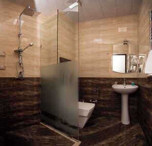 Triple Room, City View | Bathroom | Shower, free toiletries, hair dryer, slippers