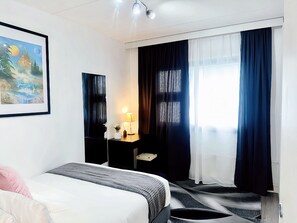 2 bedrooms, iron/ironing board, WiFi, bed sheets