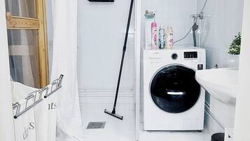 Shower, free toiletries, hair dryer, slippers