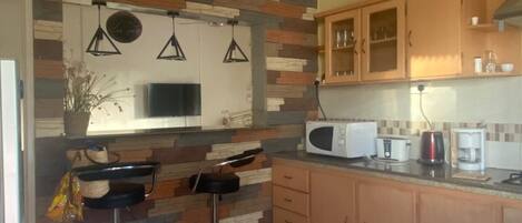 Microwave, oven, coffee/tea maker, electric kettle