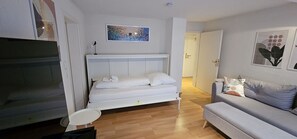 1 bedroom, desk, iron/ironing board, travel cot