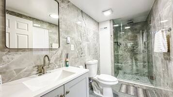 Hair dryer, towels, soap, toilet paper