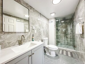 Hair dryer, towels, soap, toilet paper