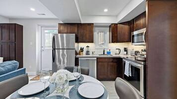 Coffee/tea maker, fridge, microwave, oven