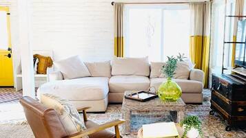TV, fireplace, books, offices