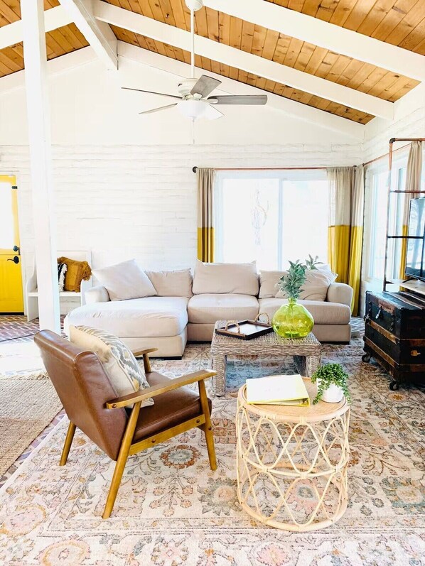 TV, fireplace, books, offices
