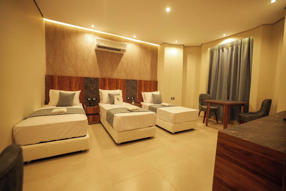 Comfort Triple Room, City View | In-room safe, free WiFi