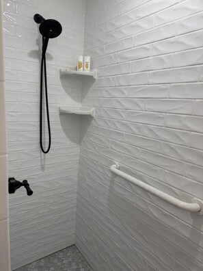 Shower, hair dryer, towels, soap
