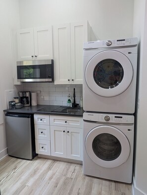 Fridge, microwave, stovetop, coffee/tea maker