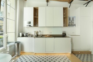 Departamento | Cocina privada | Utensilios de cocina y artículos de limpieza 