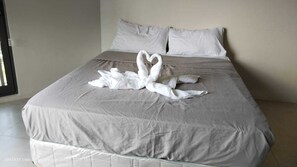 Deluxe Studio Suite, Beach View | Desk, laptop workspace, free WiFi