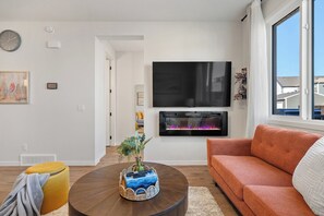 Smart TV, fireplace, foosball, computer monitors