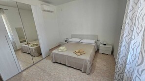 2 dormitorios, tabla de planchar con plancha, wifi y ropa de cama