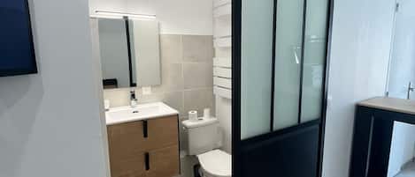 Shower, hair dryer, towels, soap