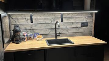 Superior Cabin | Private kitchen | Fridge, microwave, cookware/dishes/utensils