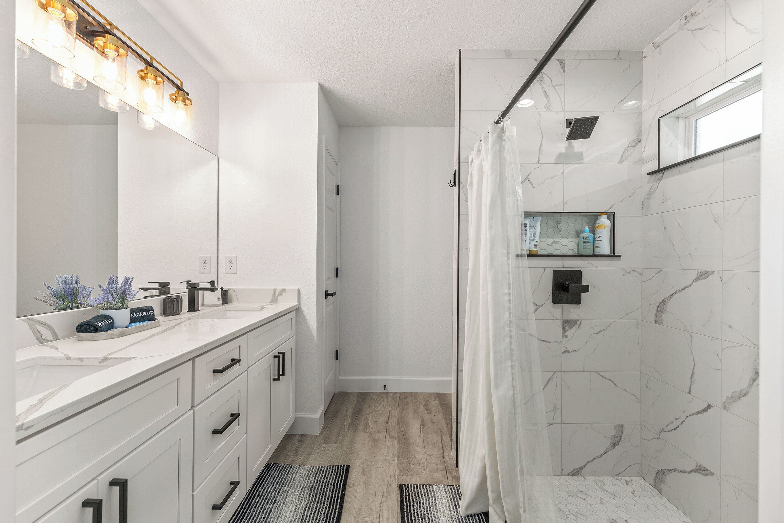 Shower, towels, soap, toilet paper