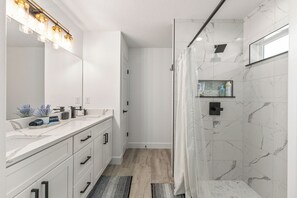 Shower, towels, soap, toilet paper