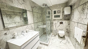 Shower, slippers, towels, soap