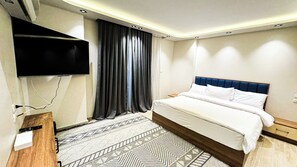 Coffres-forts dans les chambres, bureau, fer et planche à repasser
