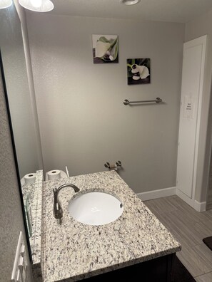 Jetted bath, hair dryer, towels, soap