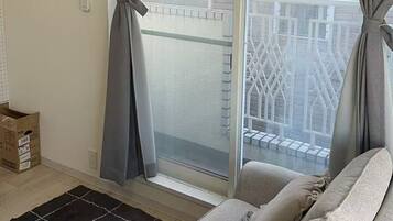 Blackout curtains, iron/ironing board, free WiFi, bed sheets