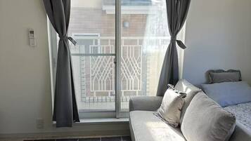 Blackout curtains, iron/ironing board, free WiFi, bed sheets