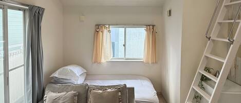 Family Duplex, Balcony | Blackout drapes, iron/ironing board, free WiFi, bed sheets
