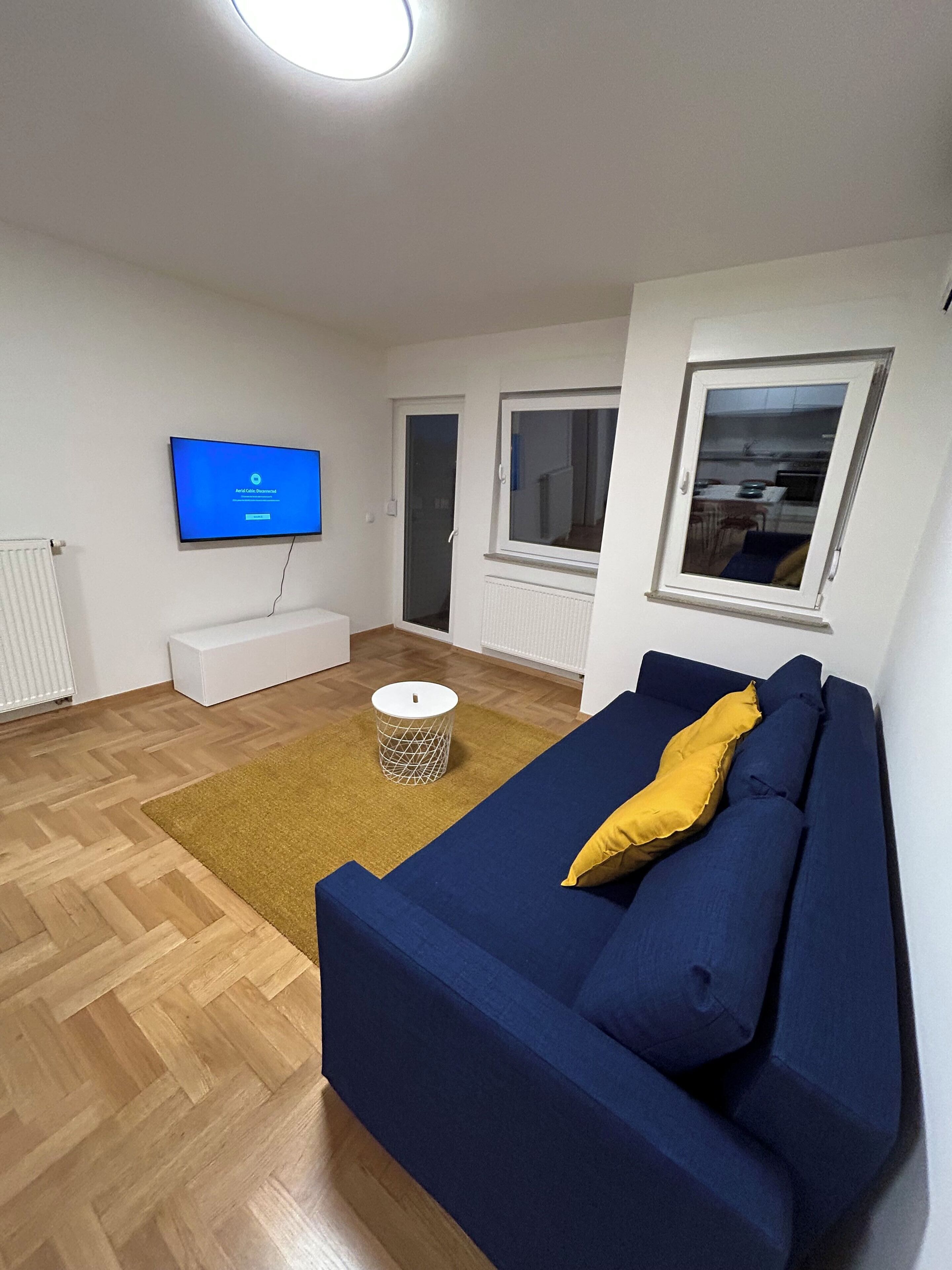 Apartamento clásico, balcón | Zona de estar