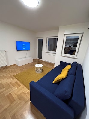 Departamento clásico, balcón | Área de sala de estar