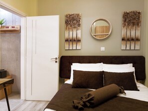 2 habitaciones, tabla de planchar con plancha, internet y ropa de cama 